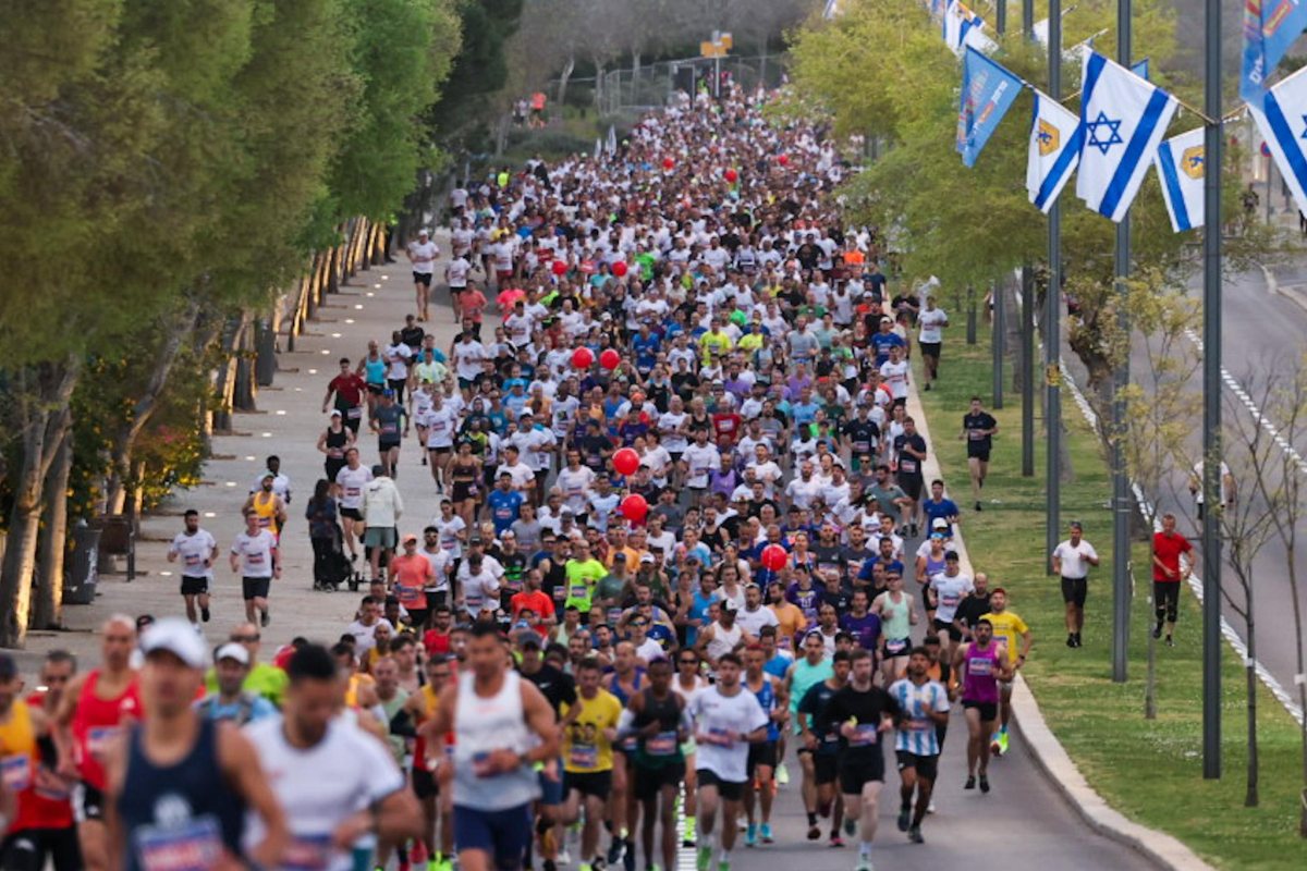 רצי המרתון { צילום: SPORTPHOTOGRAPHY
