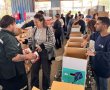 נתינה מכל הלב: עובדי ICL וארגון "לתת" אורזים חבילות מזון לחג
